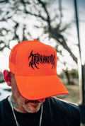 metal font blaze Orange trucker hat